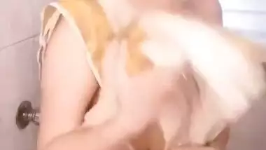 Model wet tease in bathroom video