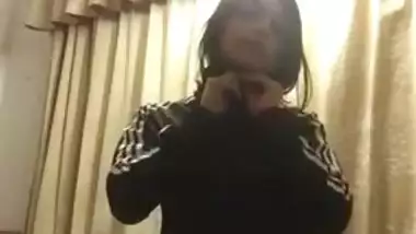 After training Indian teen performs solo sex strip show on XXX cam