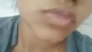 Young Desi cutie teases with her huge XXX melons for the camera