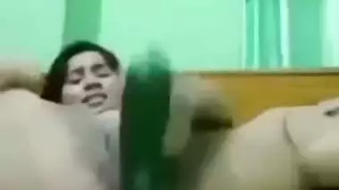 Indian girl masturbating with cucumber
