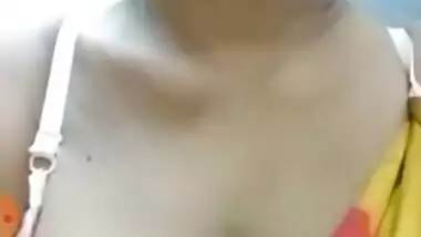 MILF aunty showing boobs out from saree and bra