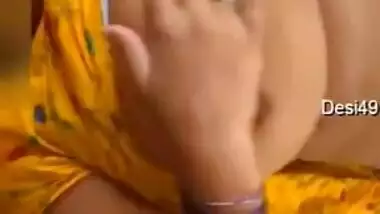 Solo Desi aunty plays with massive XXX melons lying on the floor