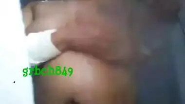 Hot bhabhi’s boobs while taking a bath