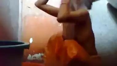 Bangladeshi Maid taking shower.
