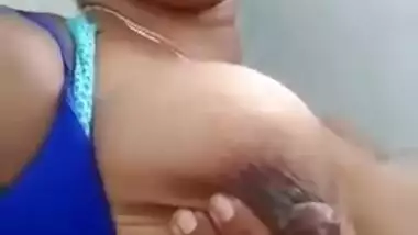 Desi wife has to milk her boobies in this amateur home XXX video