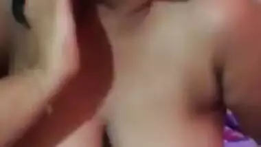 Shy Desi aunty with big XXX tits smiles while posing completely naked