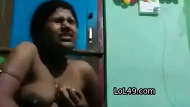 Unsatisfied village wife fingering pussy in horniness