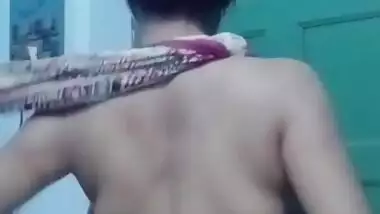 Saree without a bra and a blouse.