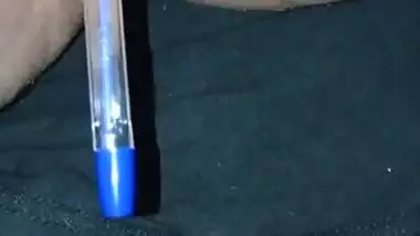 Horny Indian girl masturbating with a pen